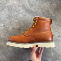 Chaussures de sécurité pour hommes en cuir véritable personnalisées avec semelle intérieure en tissu, embout en acier résistant à l'usure, vente directe d'usine
