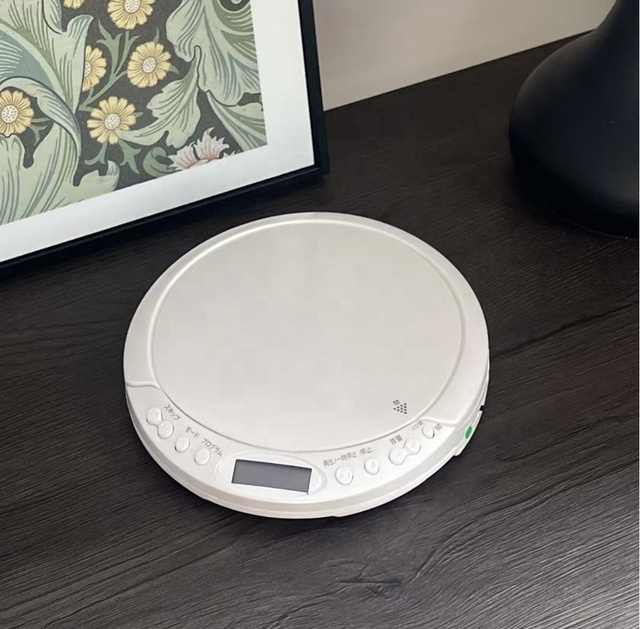 Portable CD Player with Round Design and Wireless Connectivity for Home Use