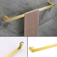 Ensemble d'accessoires de salle de bain modernes en acier inoxydable brossé doré : porte-serviettes, patère, porte-papier toilette