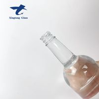 500ml Glasflaschen mit Schraubverschluss und Mattierter Oberfläche Anpassbares Design aus Shandong Kartonverpackt