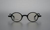 Lunettes de vue à monture en acétate transparent de conception japonaise rétro Monture optique vintage en titane pur avec plaque circulaire