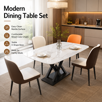 Ensemble de table à manger en pierre frittée facile à nettoyer avec base noire en forme de X et 4 chaises de couleurs mélangées, conçu pour les repas en famille