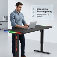 Bureau debout motorisé AOR en acier inoxydable, table de jeu informatique extensible avec éclairage LED double face, 20 modes réglables, direct usine