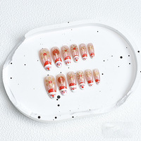 24 faux ongles à presser, forme amande, Noël, rouge, or, motif étoile scintillant, vente en gros