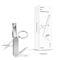 Kit de manucure pliable 5-en-1 portable pour voyage, comprenant coupe-ongles, lime à ongles, ciseaux, mini-couteau et tournevis de poche