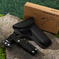 Kit de survie personnalisé OEM pour le camping en plein air multi-outils avec hache en acier inoxydable marteau couteau pince tournevis dans une gaine en nylon