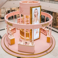Kiosque à bijoux de luxe moderne haut de gamme en or et blanc personnalisable avec éclairage LED et verre trempé pour utilisation en centre commercial
