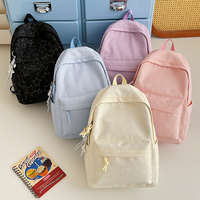 Sac à dos tendance antivol imperméable grande capacité motif géométrique en nylon gaufré léger et durable pour écoliers garçons