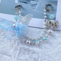 Chaîne de téléphone portable pour femme, chaîne de sac en perles, pendentif, fabrication artisanale de qualité, pompons fluides, porte-clés papillon double couche