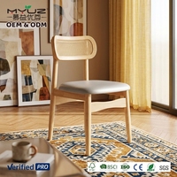 Chaise de salle à manger MYUZ 2026 style bohème chic avec structure en bois de manguier massif et assise en tissu vert sauge avec finition blanchie à la chaux, chaise de salle à manger en rotin