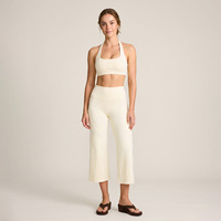 Nouvel ensemble de sport pour femme avec soutien-gorge dos nu personnalisé, respirant, et pantalon capri large pour le fitness, le yoga et la gym