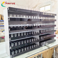 Vitrine à cigarettes sur pied moderne personnalisée avec cadre métallique, éclairage LED, hauteur réglable et poussoir automatique pour tabac