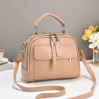Sacs à main multifonctionnels imperméables en PU, tendance, portables, avec fermeture éclair, pour voyages, vente en gros, pour femmes, avec doublure en polyester