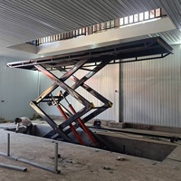 Elevador de Carga Xinchaoyue con Certificación CE, Elevador Eléctrico con Altura de Elevación de 3-15 m, Plataforma de Elevación Fija, Construcción de Acero, Capacidad de Carga de 650 kg a 50000 kg