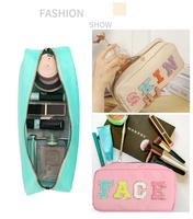 Nouvelle pochette à maquillage personnalisée pour femmes grande capacité style broderie lettre en couleur avec fermeture éclair pochette à bonbons en nylon avec logo sac cosmétique