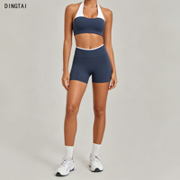 Ensemble de yoga deux pièces color block avec haut dos nu sans manches à coussinets amovibles et short taille haute à bordure contrastante pour l'extérieur