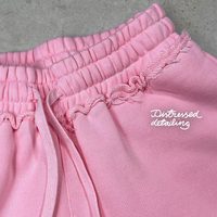Fabricant OEM de survêtements : Ensembles de survêtements pour femmes, comprenant des sweats à capuche courts et des sweats à capuche amples lavés, rose délavé effet usé, style délavé à l'acide, et des pantalons de jogging.