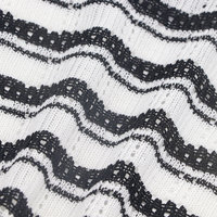 Tissu de vêtement en maille jacquard 100 % polyester 200 GSM pour la confection de robes