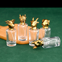 Flacon pulvérisateur de parfum vide en verre cylindrique 50 ml, qualité supérieure OEM ODM, avec capuchon tête d'animal et base lourde, pour échantillons de parfum, prix compétitif