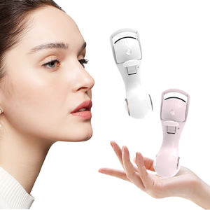Recourbe-cils chauffant <span class=keywords><strong>Magiccurl</strong></span> Mini, recourbe-cils électrique portable en plastique, outil de maquillage pour femmes, usage quotidien et en salon - Product Image 1