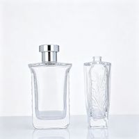 Flacon de parfum en verre transparent de luxe personnalisé avec boîte, 100 ml, vaporisateur à pompe, design plat, emballage avec marquage à chaud, MOQ 100 pièces