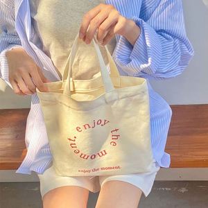 Wholesale Letter Printed Custom Logo Canvas Cotton Rope Handle Reusable <b>Folding</b> Tote <b>Bag</b> - Product Image 2