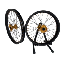 Jeu de roues Surron Ultra Bee tout-terrain 21/18, jantes noires, moyeu doré pour moto électrique tout-terrain Enduro