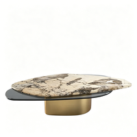 Table basse résidentielle Dream Home en matériaux mixtes, plateau ovale arrondi en marbre et bois, pieds massifs bombés