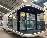 Maison conteneur de style capsule en structure acier écologique personnalisée pour hébergements de camping en plein air avec observation des étoiles intégrée