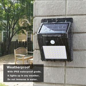 30 <b>LED</b> Solar Battery Powered <b>Led</b> Outdoor Wall <b>Lights</b> Interaction Sconce Lamp With <b>Motion</b> <b>Sensor</b> WADE-JS024 Solar Wall <b>Light</b> WADE - Product Image 6