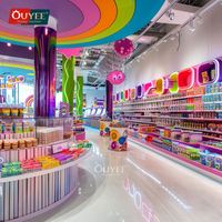 Ouyee Étagères de présentation géantes pliables pour décoration de boutique de chocolat, mobilier coloré pour confiserie avec garantie de 3 ans pour la vente au détail