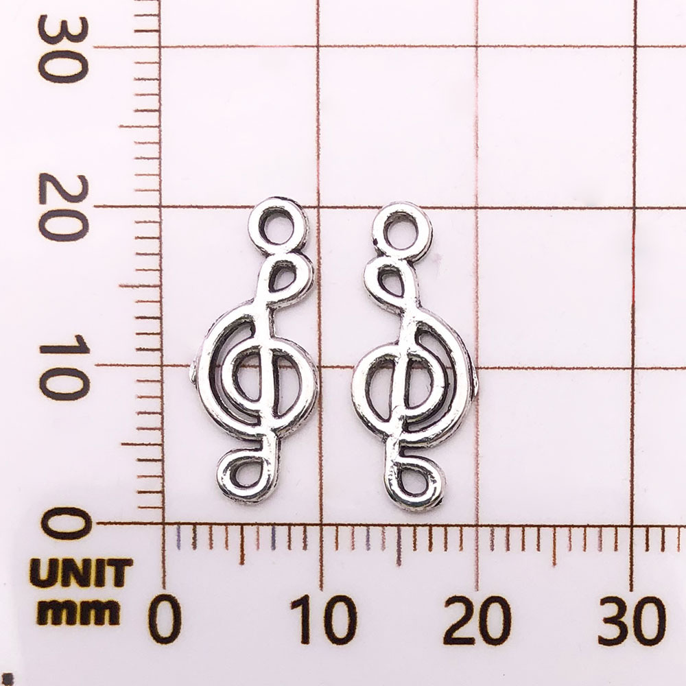 Une note de musique antique en argent - 0,5g - 8*20mm - 6401