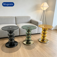 Table basse en verre ondulé au design artistique moderne, motif bulles empilées, durable, éco-responsable, avec structure en métal/verre pour salon et canapé