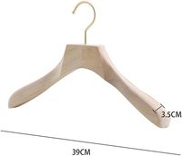 Cintres en bois de luxe personnalisés avec pince à pantalon pour boutique de vêtements, hôtel et armoire