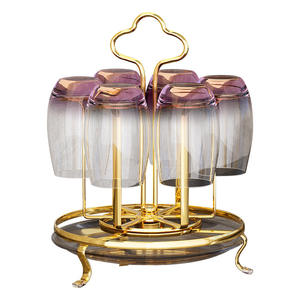 Support de tasse rotatif en fil de fer, style simple, rotation à 360 degrés, pour la maison et la salle de thé - Product Image 1