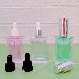 <strong>35ml</strong> Empty Cosmetic Oil Serum Glass Dropper <strong>Bottle</strong> with White Black Dropper Lids - Product Image 1