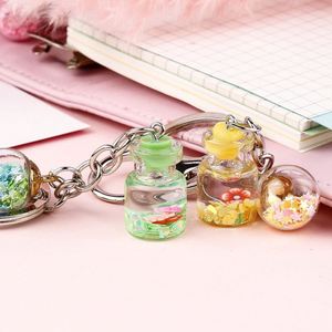 Porte-clés liquide en acrylique avec sable mouvant pour femme, pendentif de sac créatif et mignon pour couple, porte-clés flottant, cadeau - Product Image 2