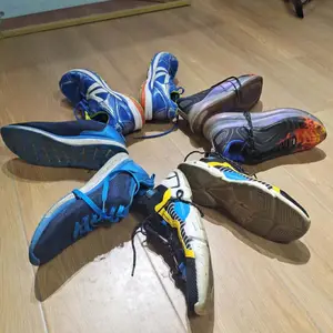 Prezzo a buon mercato scarpe in pelle 2023 stock dalla cina usato per uomo che corre scarpe sportive usate da donna scarpe da ginnastica
