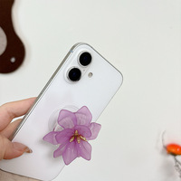 Support de téléphone de bureau à motif floral, prise rétractable, couleur unie, dos adhésif pour compatibilité universelle, placement stable