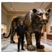 Statue de léopard tacheté en cuivre coulé sur mesure de grande taille pour la décoration de villas, d'hôtels et de parcs