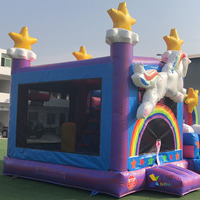 Château gonflable commercial combiné en PVC avec toboggan, château licorne et structure de saut