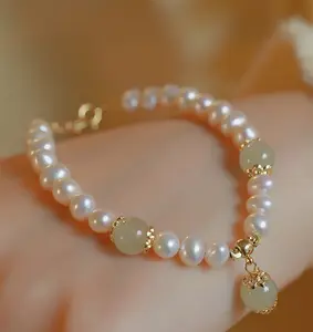 zhiteng wholesale bracelets freshwater natural pearl hetian jade 14K gold elastic thread fashion jewelry bangles for women