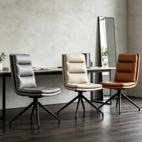 Chaise de salle à manger moderne nordique de luxe léger avec revêtement en cuir, structure pivotante en métal et panneau de fibres à densité moyenne pour la maison