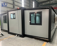 Maison conteneur gris clair de 30 pieds, préfabriquée temporaire et extensible, pour espaces familiaux, appartement pour seniors, bureau sur site, vacances à la plage