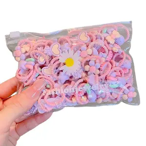 20 Stück heiße Kinder niedliche Zuckerfarbe kleines Mini-Daumenhaarband-Set schöne Gummibänder Mädchen-Haarzubehör für Kinder