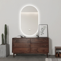 Miroir intelligent anti-buée moderne avec LED, IP44, forme ovale personnalisée, éclairage LED à intensité variable, miroirs de salle de bain pour hôtel