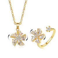 Ensemble collier et bague réglable anti-anxiété relaxant pour femme, avec pendentif moulin à vent rotatif en zircon étincelant incrusté de cuivre