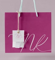 Sac à provisions en papier d'art avec logo personnalisé emballage en gros sac en papier kraft avec logo en relief pour vêtement