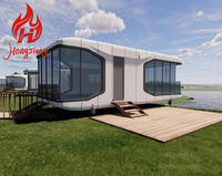 Maison capsule spatiale moderne préfabriquée pratique en promotion avec structure en conteneur d'acier pour chambre d'hôtel et usage de magasin mobile