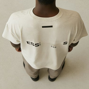 T-shirt tendance en coton ample, texture confortable et durable pour jeunes hommes - Product Image 1